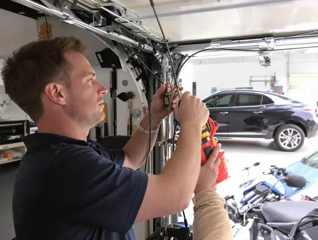 Port Orange Garage Door Repair safety certified technician performing cable replacement in Port Orange