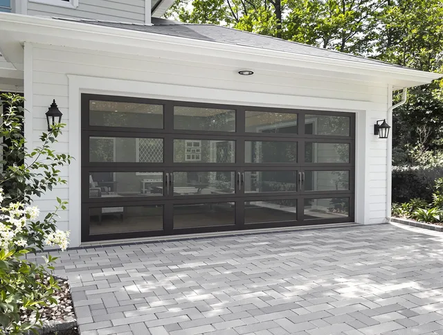 Port Orange Garage Door Repair design specialist presenting custom garage door options to Port Orange homeowner