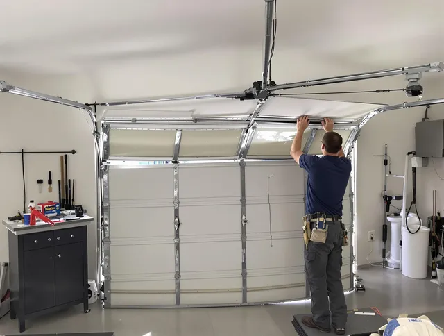 Port Orange Garage Door Repair specialist performing precise section replacement on Port Orange garage door