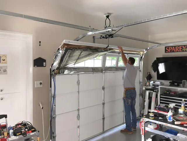 Garage door section replacement by Port Orange Garage Door Repair in Port Orange