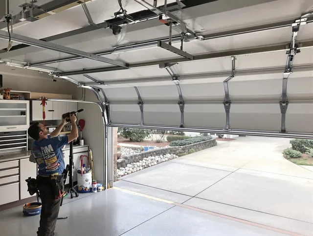 Garage door track repair service by Port Orange Garage Door Repair in Port Orange